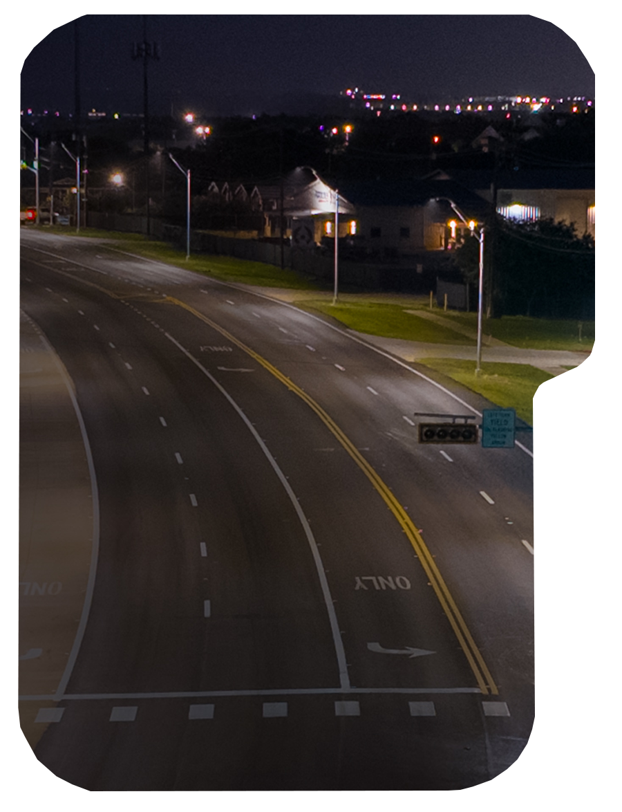 nighttime with city lights and signal light image